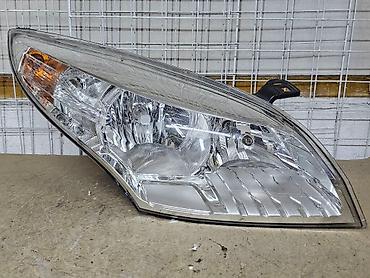 Передние фары: Передняя правая фара Renault 2010 г., Б/у, Оригинал, Германия — 2
