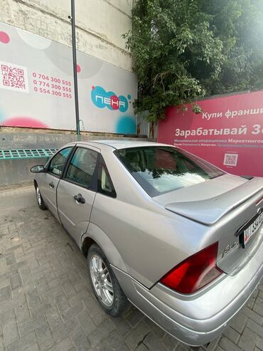 авто в рассрочку в бишкеке без процентов: Седан Ford Focus в серебристом цвете, оснащенный спойлером на крышке