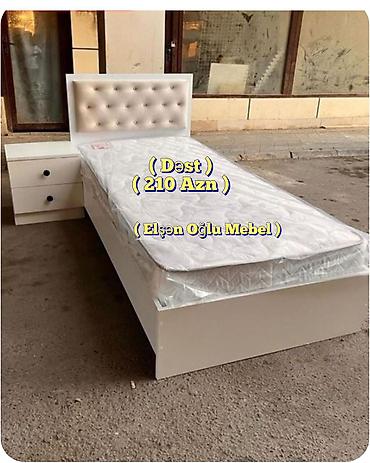 Ağ rəngdə tək nəfərlik yataq dəsti. Komplekt: - Yumşaq, düyməli