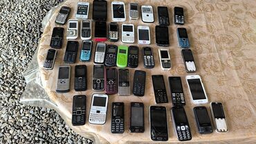 Digər mobil telefonlar: Müxtəlif markalara məxsus, düyməli və sensor ekranlı mobil telefonlar