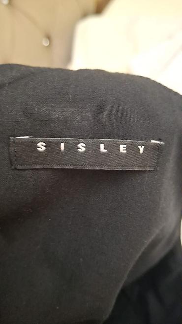 cins kombinzon: Sisley brendinin qadın üçün qara kombinezonu. - Model: dərin — 1