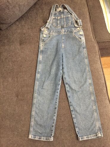 джинсовый комбинезон: Джинсы и брюки