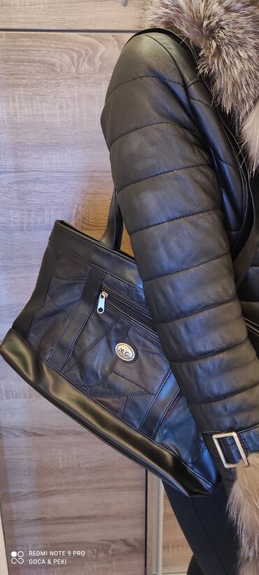 torba i kacketi:  MC nova velika kožna torba, 2 đžepa sa spoljne strane 3 đzepa unutar