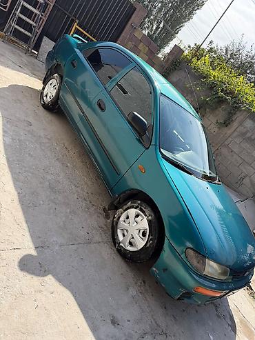 рама газ 52 53: Mazda 323: 1996 г., Механика, Бензин, Седан — 1