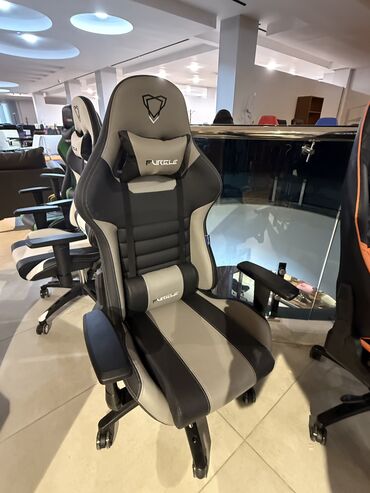 Ofis və oyun kresloları: Təkərli, Qolları tənzimlənir, Süni dəri — 20