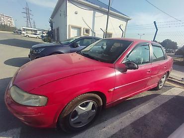 Opel: Opel Vectra B, qırmızı rəng, sedan/götürmə tipli kuzov (5 qapı) — 3