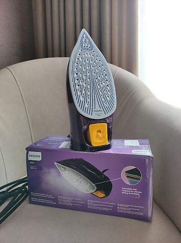 Утюги: Утюг Philips DST7061 Характеристики: Постоянная подача пара: 55 г/мин — 2