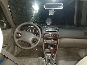 Toyota: Toyota Corolla: 1.6 л | 1999 г. Седан — 2