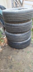 диски колесные легкосплавные таврия: 195/65 R15 5 bolt təkərlər.opel vectranin üstünən çıxıb .Mersedes edə
