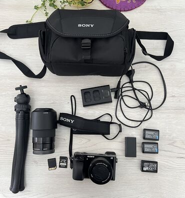 Фотоаппараты: Sony A6000 Камера + 2 линзы (1- 16х15мм), (2- 55х210мм) Сумка, штатив