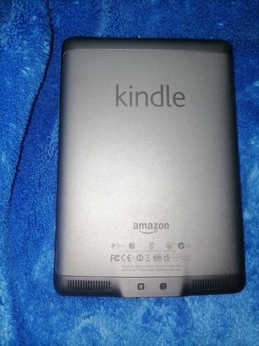 Elektron kitablar: Amazon Kindle 4 GB 3000 kitab yeri var her şeyi işleyir google 2011