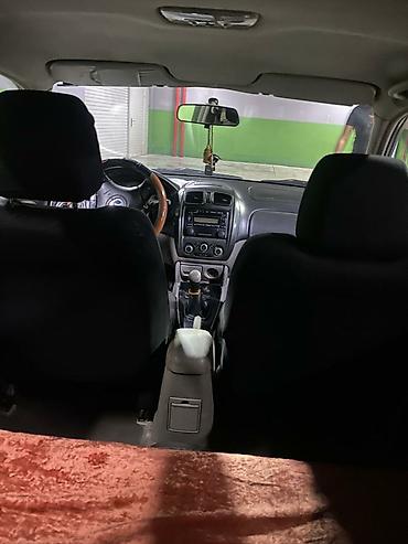 familia: Mazda Familia: 2000 г., Механика, Бензин, Хэтчбэк — 4