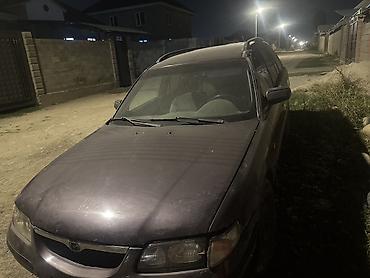 аудио касета: Mazda 626: 1997 г., 1.8 л, Механика, Бензин, Универсал — 2