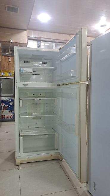 Soyuducular: İki qapılı (üstdən donduruculu) məişət soyuducusu Xüsusiyyətlər: - — 2
