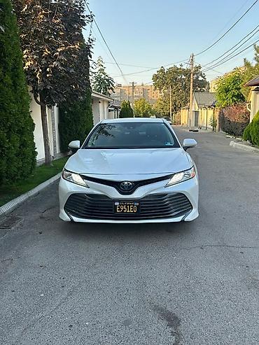 камбой: Toyota Camry: 2020 г., 2.5 л, Автомат, Гибрид, Седан — 1