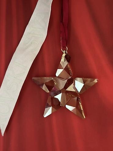 Bayram məhsulları: Svarovski Ulduz. Cox parıldaqdır və əsl svarovski ulduzudur. STAR — 2