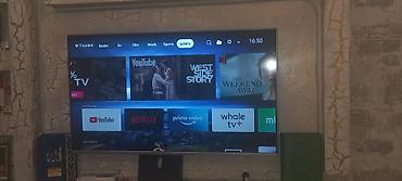Телевизоры: Smart TV – TAUBE interfeysi ilə - Ekran: Təxminən 55–60 düym — 2