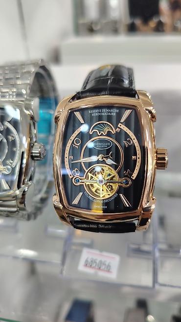 Aksesuarlar: Parmigiani Fleurier – Tonneau formalı, mexaniki, Swiss Made kişi saatı — 1