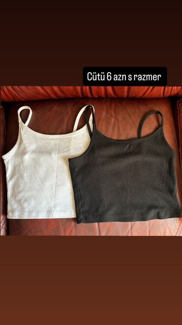 Futbolka və maykalar: İki ədəd qadın ribana qarınüstü top (crop top) dəsti. - Rənglər: ağ və