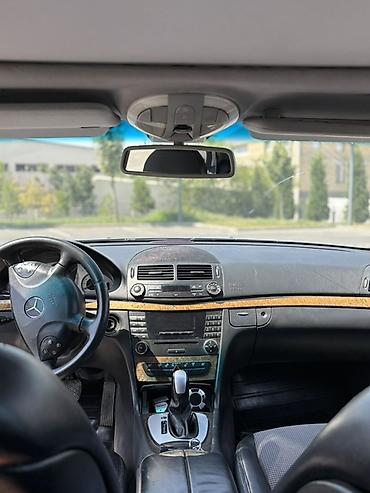 cls 63 amg: Mercedes-Benz E 200: 2 l | 2004 il Sedan — 8