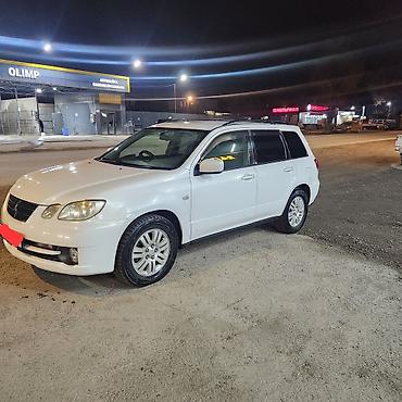митсубиси аиртек: Mitsubishi Airtrek: 2002 г., 2 л, Автомат, Бензин, Универсал — 3