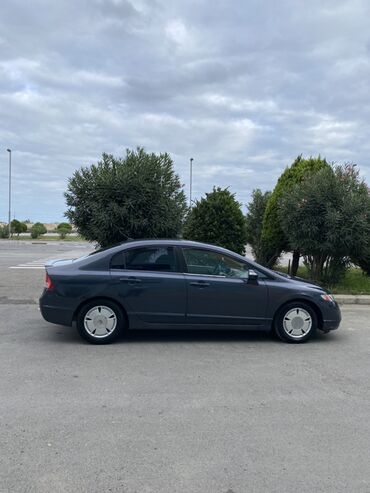 Honda: Honda Civic: 1.3 l | 2006 il Sedan — 11