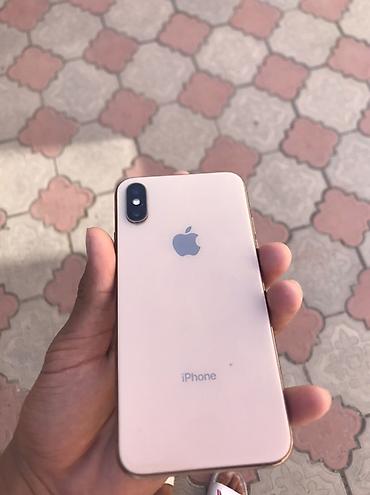 poco m5c: IPhone Xs, Б/у, 64 ГБ, Золотой, Чехол, 100 % — 1