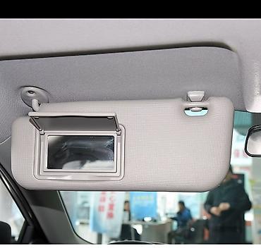 Детали салона: Солнцезащитный козырек на Toyota Corolla 8 — 3