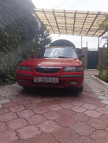 Транспорт: Mazda 626: 1998 г., 2 л, Механика, Бензин, Хэтчбэк — 5