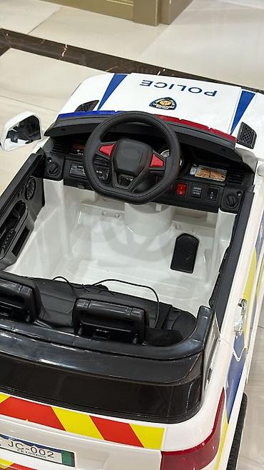 Uşaq üçün elektrik maşınları: Uşaq üçün elektrikli polis maşını - Dizayn: Ağ rəngli kuzov — 4