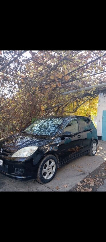 куплю в рассрочку автомобиль: Mazda : 2003 г., 1.3 л, Автомат, Бензин