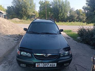 Продажа авто: Mazda Familia: 1998 г., Механика, Универсал — 1
