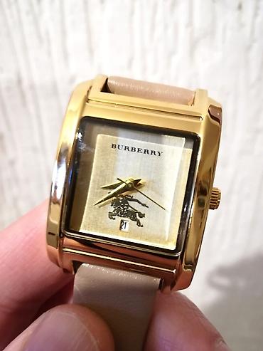dz09 smart watch: Odlican zenski rucni sat poznate marke Burberry. U pitanju je kvarcni — 2