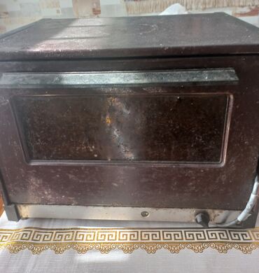et ucun vitrin soyuducular: Elektrik mini-sobası - Stolüstü elektrik sobası, şəbəkə ilə işləyir