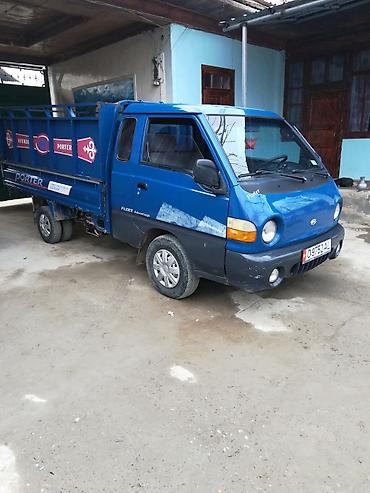 atego автовоз: Hyundai Porter — компактный бортовой грузовик синего цвета. Основные — 1