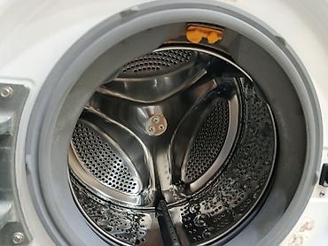 den 8: Стиральная машина LG с фронтальной загрузкой, Inverter Direct Drive — 1
