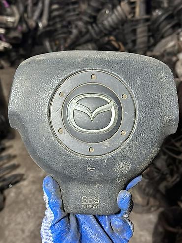 maz: Подушка безопасности водителя (SRS Airbag) для руля Mazda. - — 1