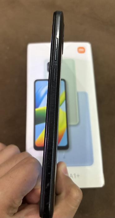 m50 qara: Redmi A1+ – smartfon - Ekran: 6.52" HD+ böyük displey, damcı tipli — 3