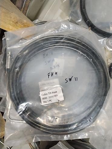 Рукав подъёма кабины (Cabin Tilt Hose) - Назначение: гидравлический