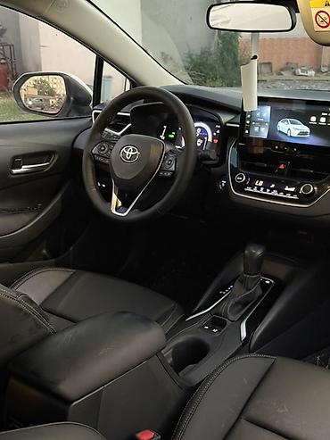 Toyota: Toyota Corolla: 2023 г., 1.8 л, Гибрид, Седан — 5