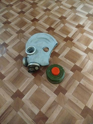 Противогаз с фильтром Описание: - Полумаска из эластичной резины с