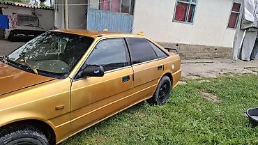 Mazda: Mazda 626: 1988 г., Механика, Седан — 4