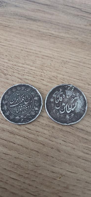 1.Pəhləvi dövrü (1926-cı il / 1305): 2 Qıran (2000 Dinar). Məşhur "Şir