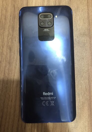 fly bl6401 телефон: Xiaomi Redmi Note 9, 128 ГБ, цвет - Синий, 
 Сенсорный, Отпечаток пальца, Две SIM карты