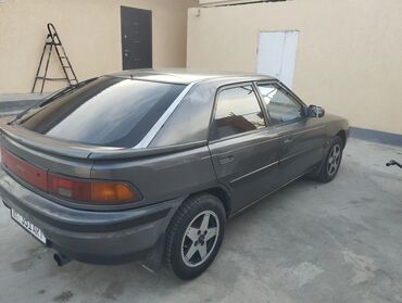 Mazda: Mazda 323: 1991 г., 1.6 л, Механика, Бензин, Хэтчбэк