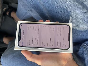 срв 2018: IPhone 12, белый цвет. На экране «О телефоне» указано - Модель: iPhone — 2