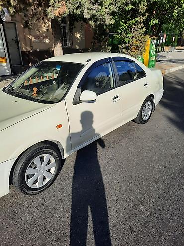honda dio moped: Nissan Sunny: 1.3 l | 2006 il Sedan — 3