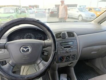 магнитофон для авто: Mazda PREMACY: 2000 г., 2 л, Механика, Дизель, Хэтчбэк