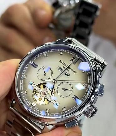 apple watch series 1: Patek Philippe kişi qol saatı – zərif mexanika və klassik dizayn - — 2