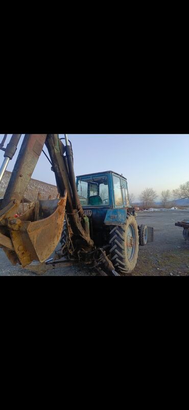 Qoşqular: Tam işlək vəziyyətdə eksiqavatora yığılmış traktor satlır.bu günki